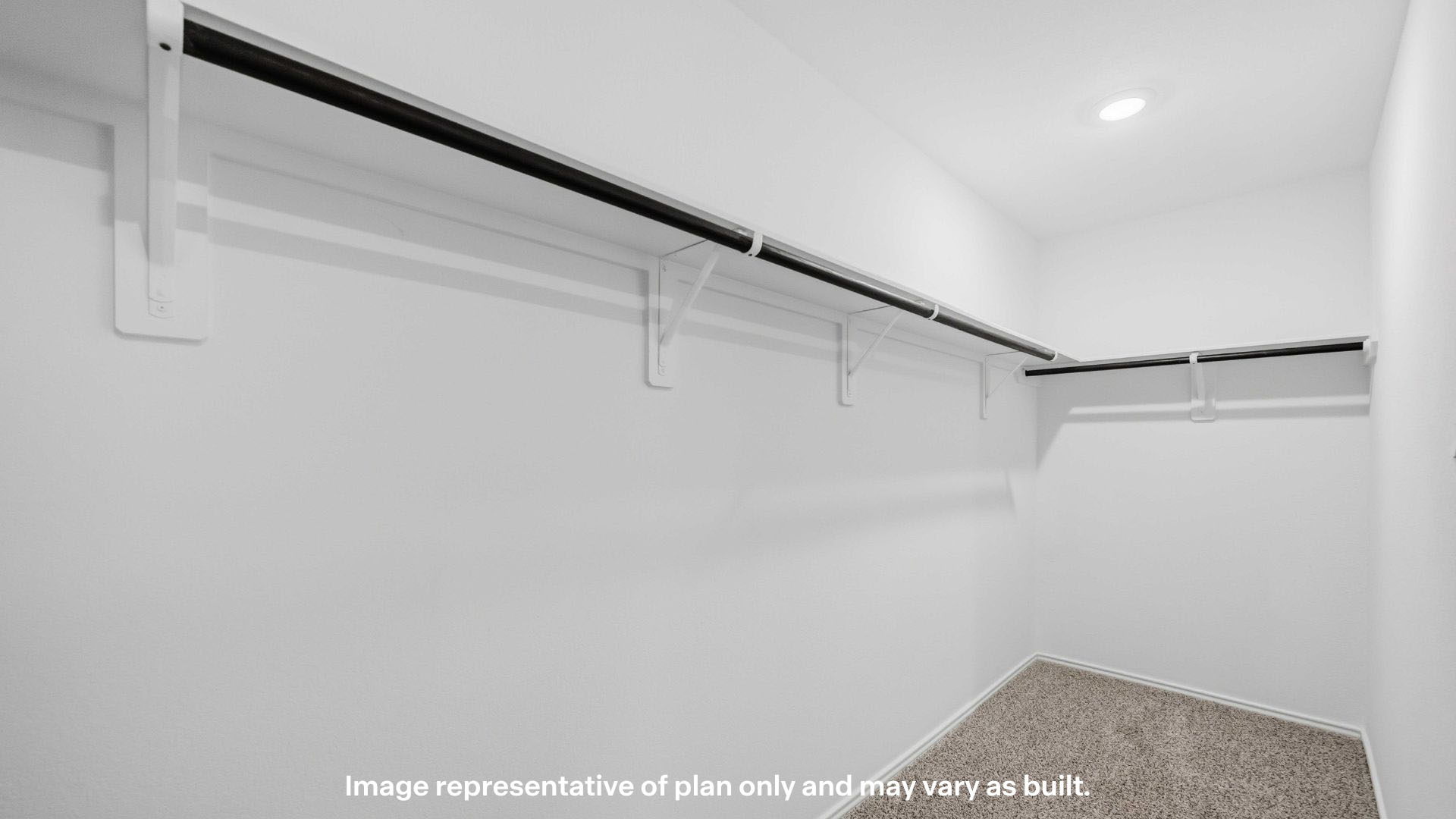 Primary walk-in closet with extra storage space