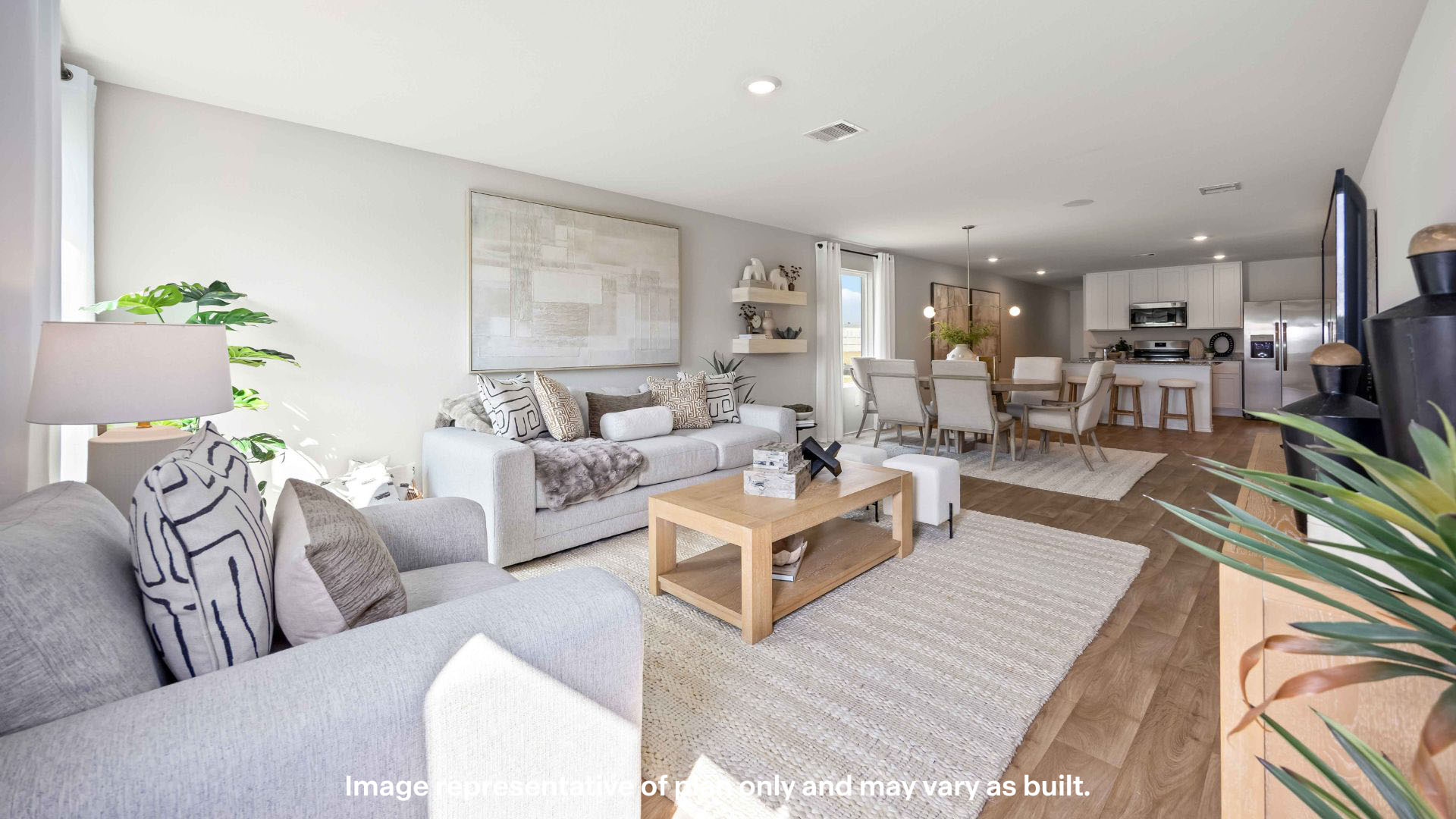 Open concept kitchen, living, family, and dining room space
