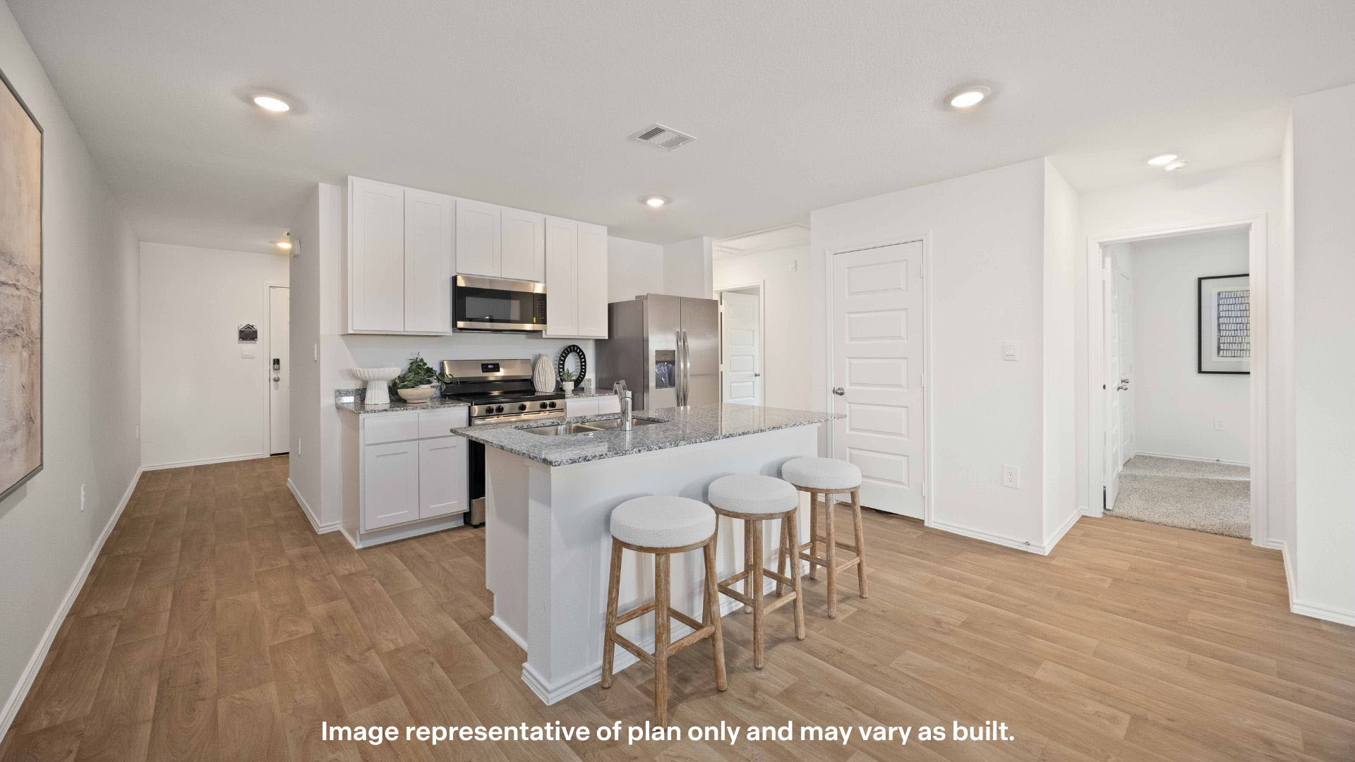 Spacious open concept kitchen with island and counter prep space