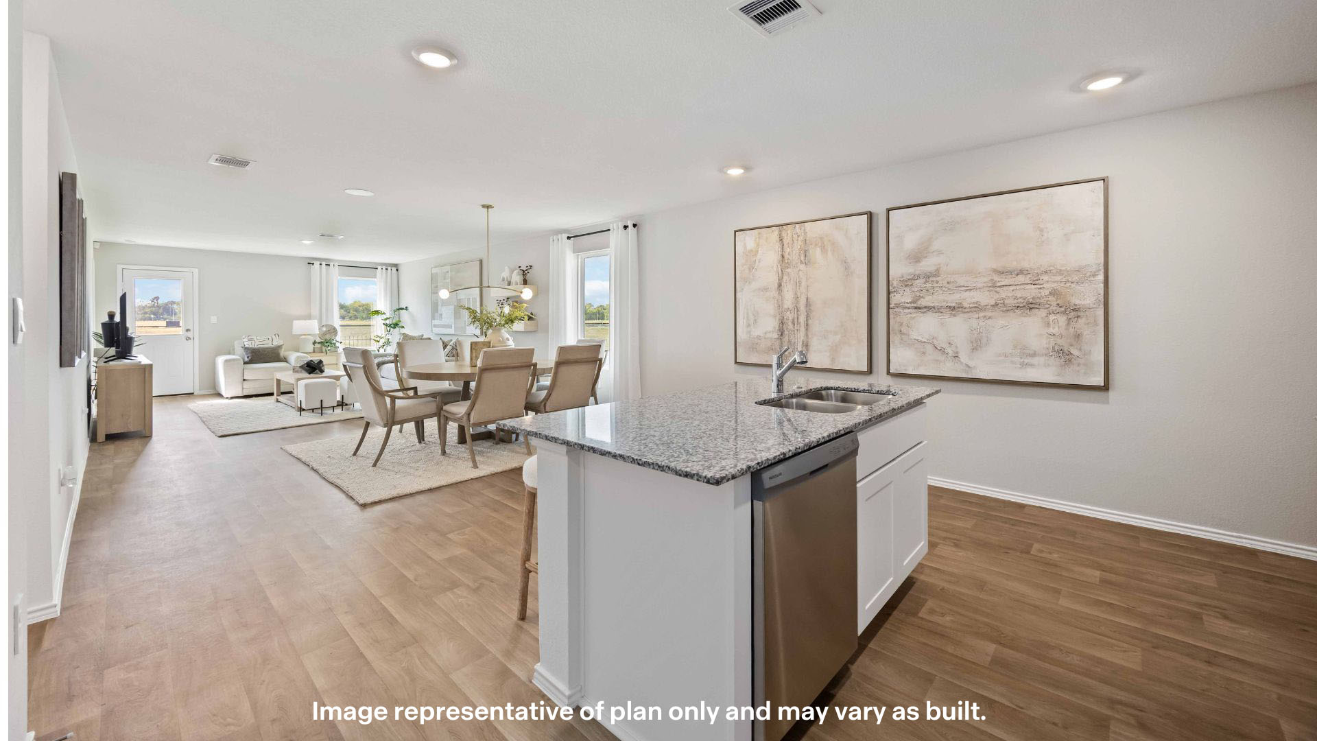 Open concept kitchen, living, family, and dining room space