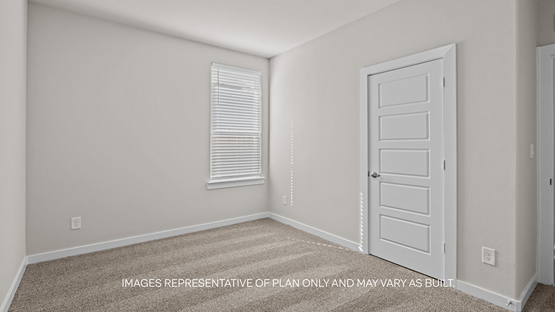 Guest bedroom 3 with plush carpet floors and spacious closet