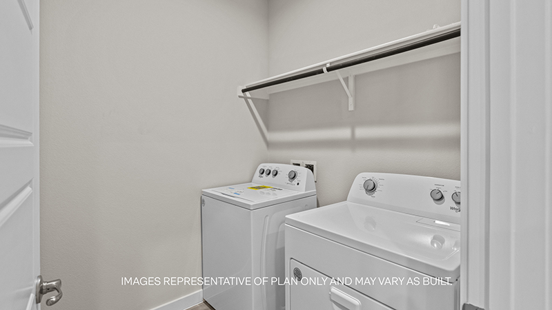 Laundry room and utility closet space with extra storage