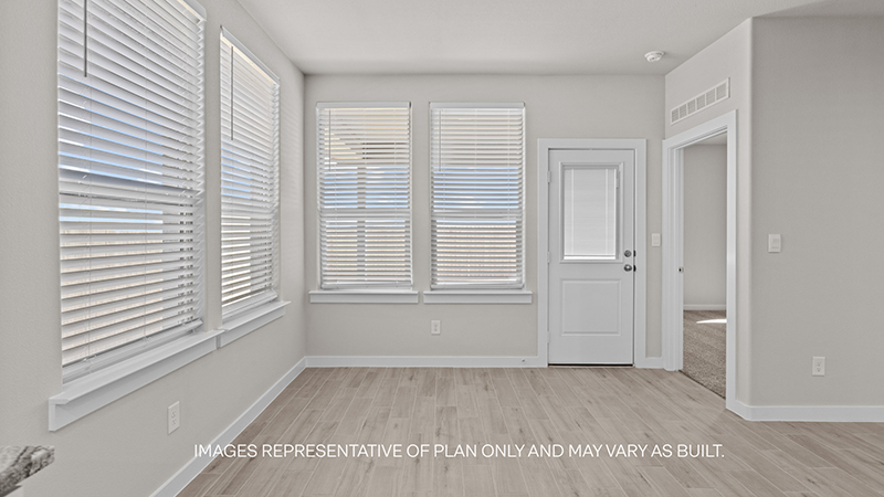 Open dining room space adjacent to kitchen