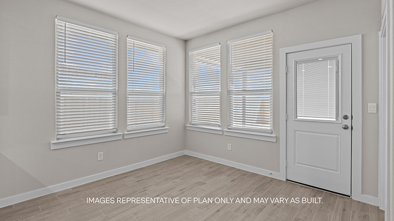 Open dining room space adjacent to kitchen