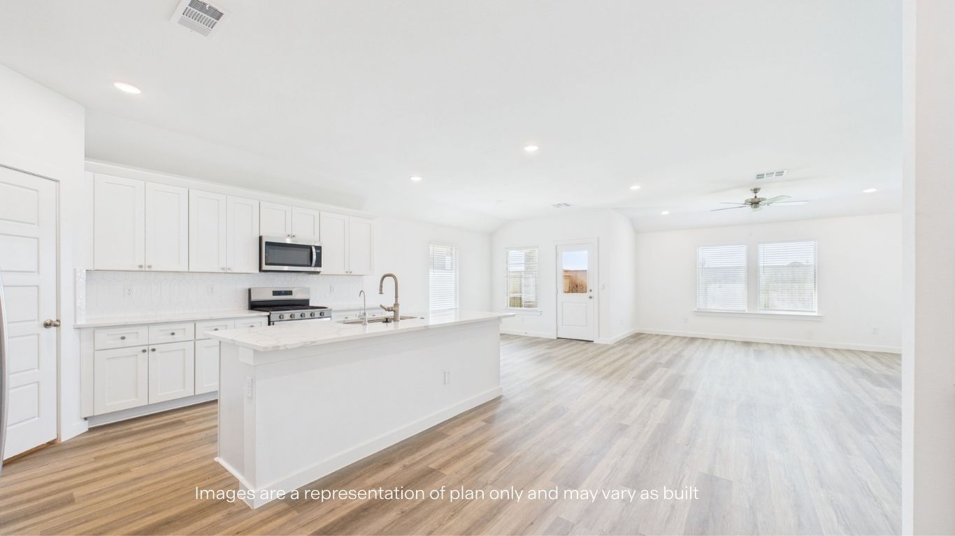 Open concept kitchen, living, family, and dining room space
