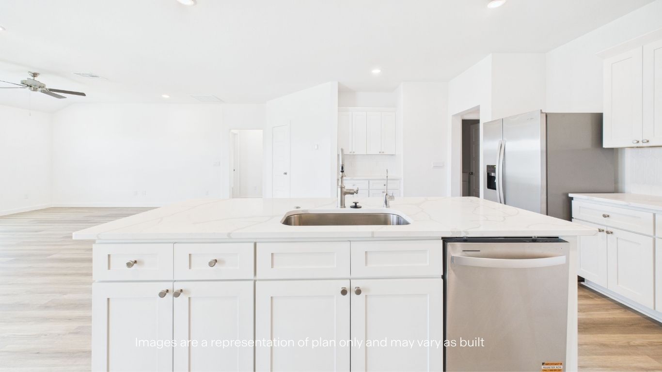 Open concept kitchen with stainless steel appliances, shaker style cabinets, and elevated finishes