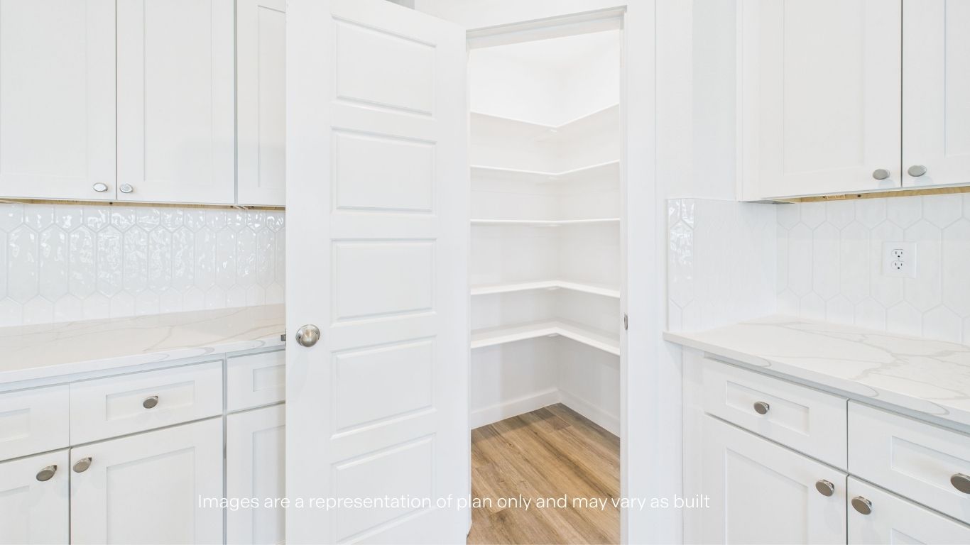 Spacious pantry cornered between kitchen area