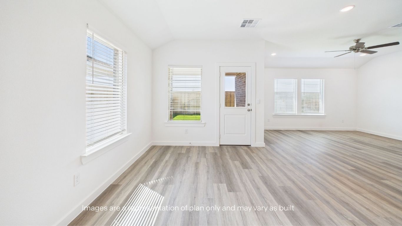Open dining room space adjacent to kitchen