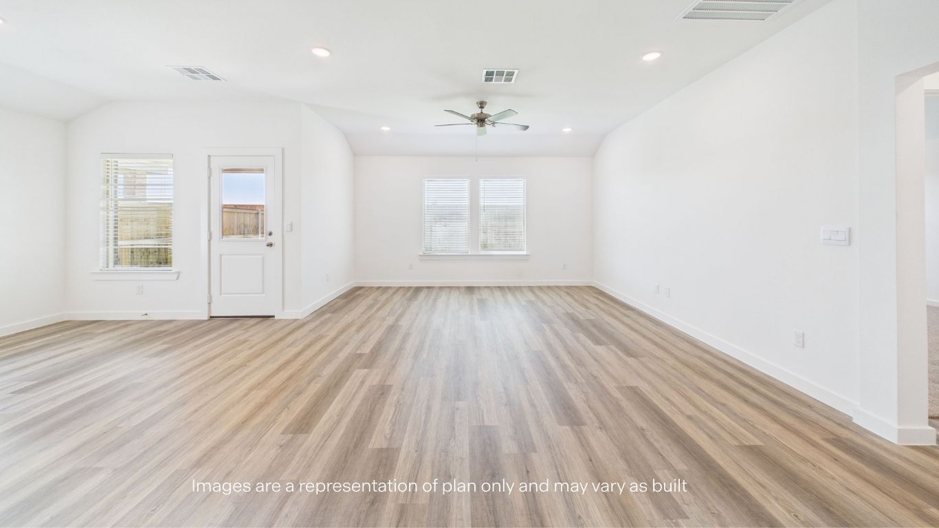 Open living and family room area with ample natural light