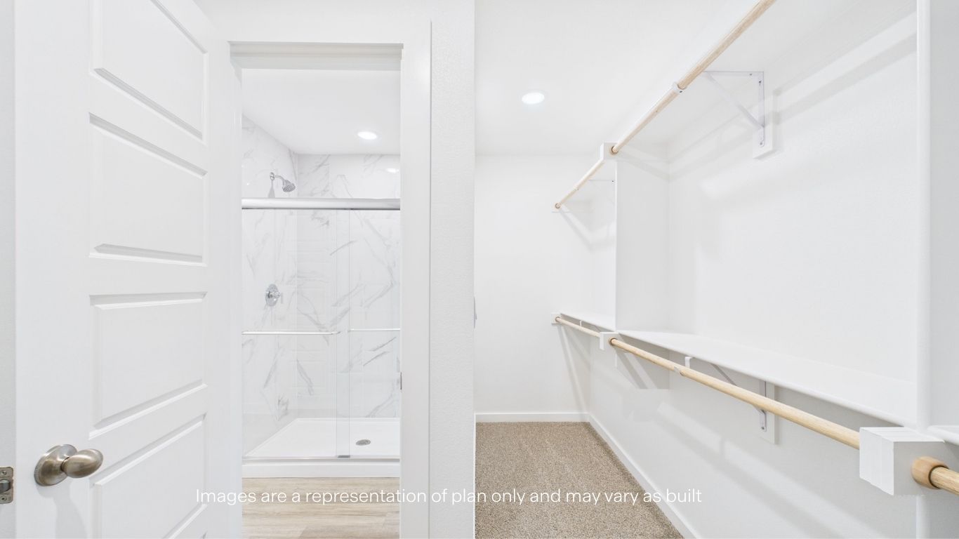 Primary walk-in closet with extra storage space