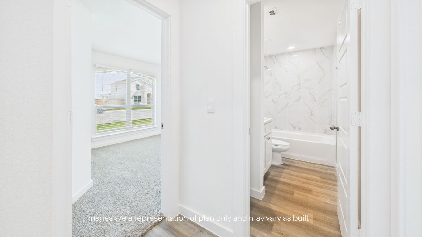 Guest bedroom 1 and bathroom between rooms