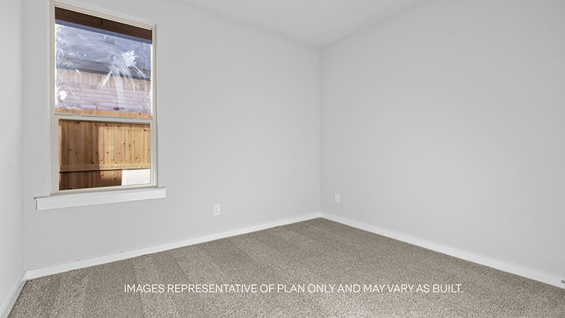guest bed with plush carpet and spacious closet
