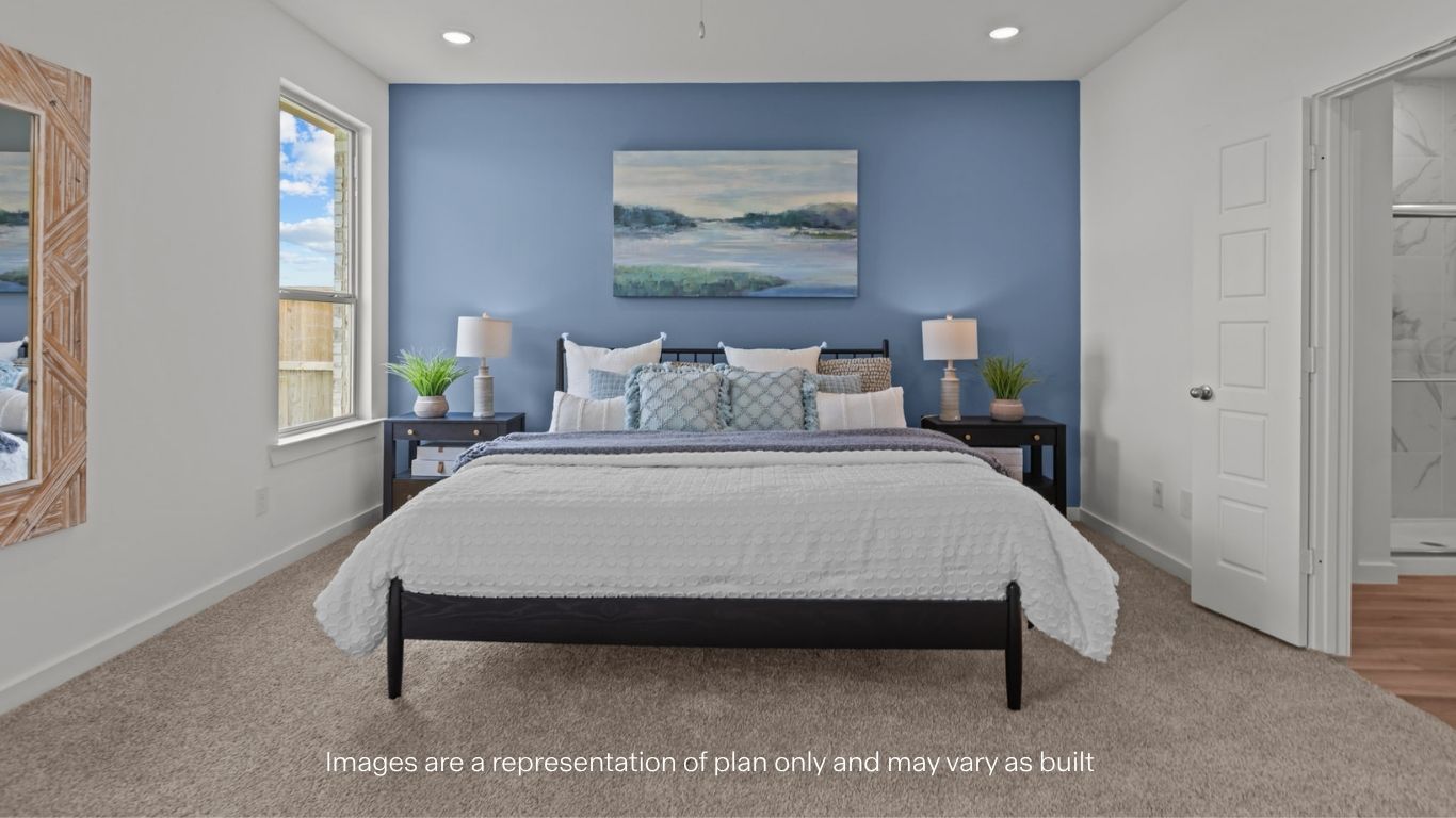 Primary bedroom with plush carpet floors and light allowing double windows