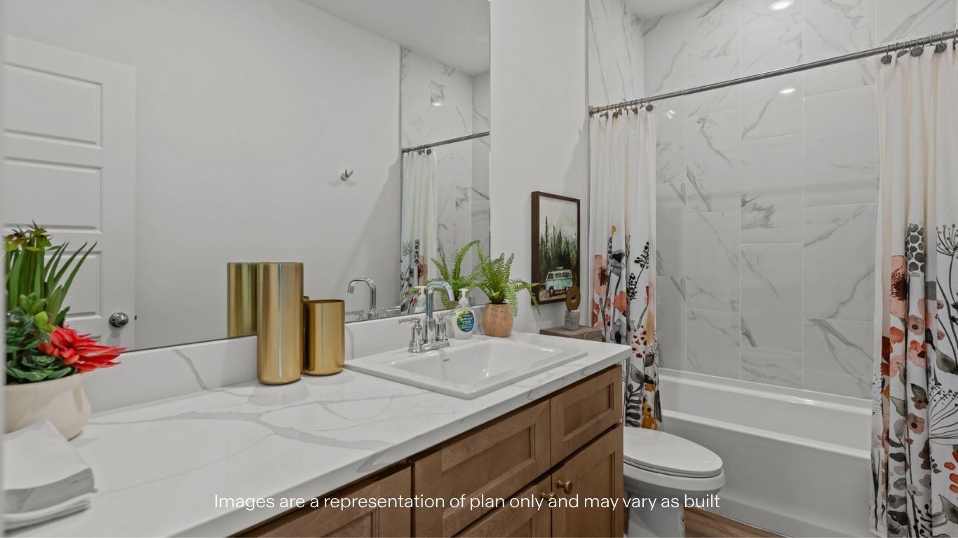 Guest bathroom located between guest bedrooms