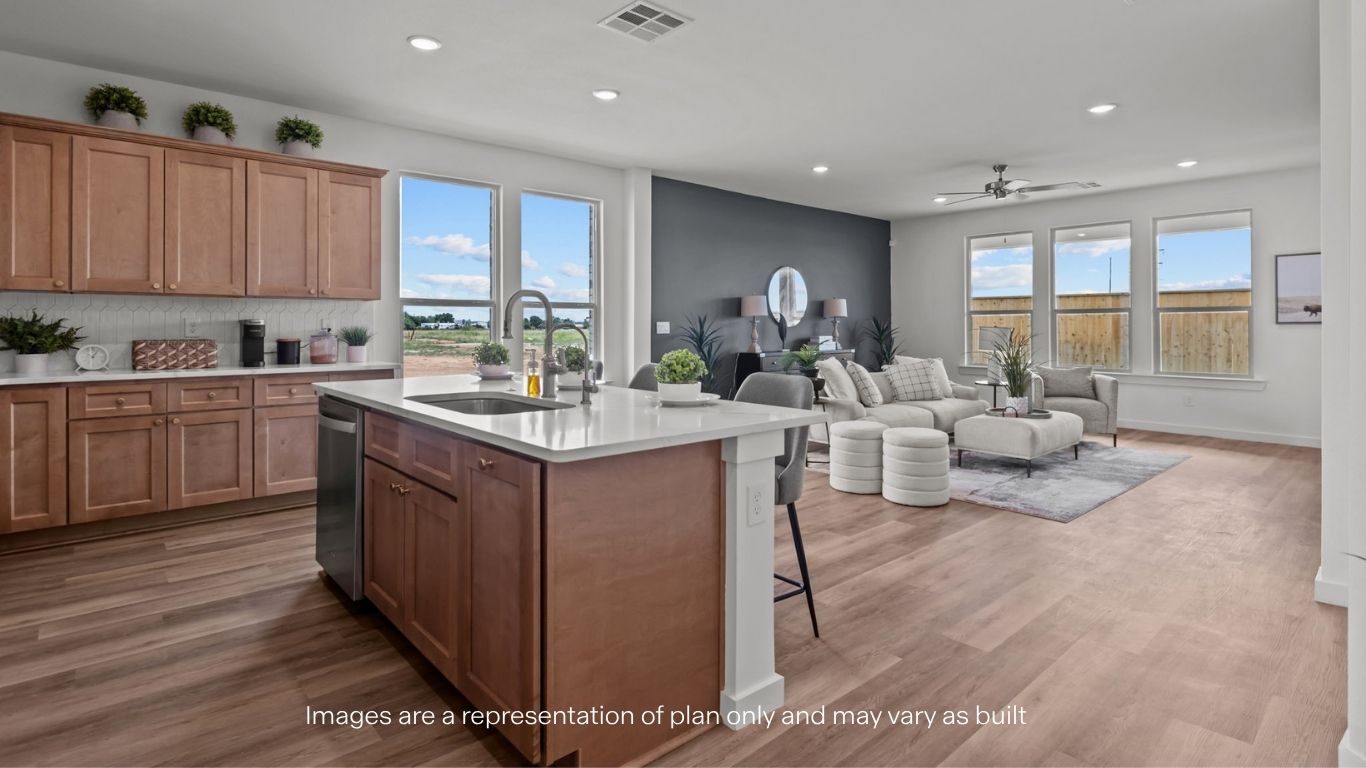Spacious open concept kitchen with island and counter prep space