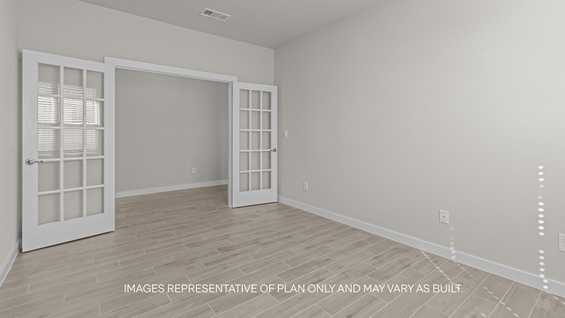 study room with vinyl plank flooring and white interior with window