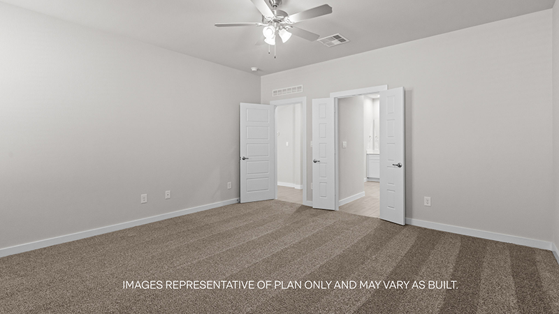 primary bedroom with attached bathroom