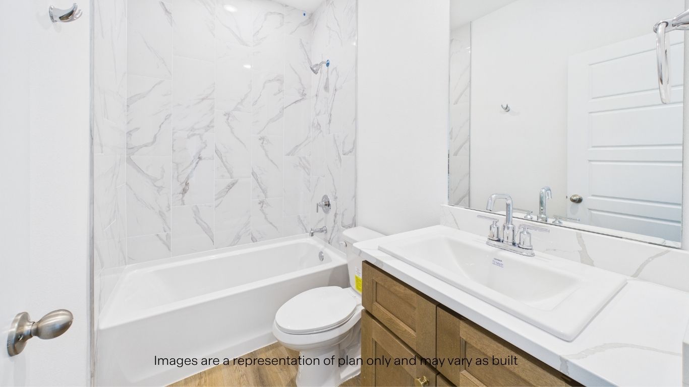 Guest bathroom located between guest bedrooms