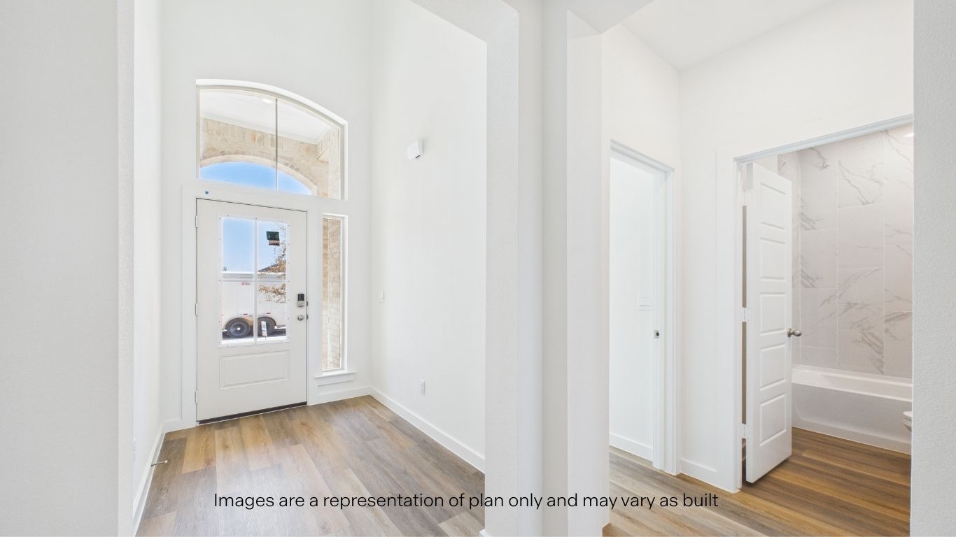 Front entry space with guest room 1 and restroom to the side