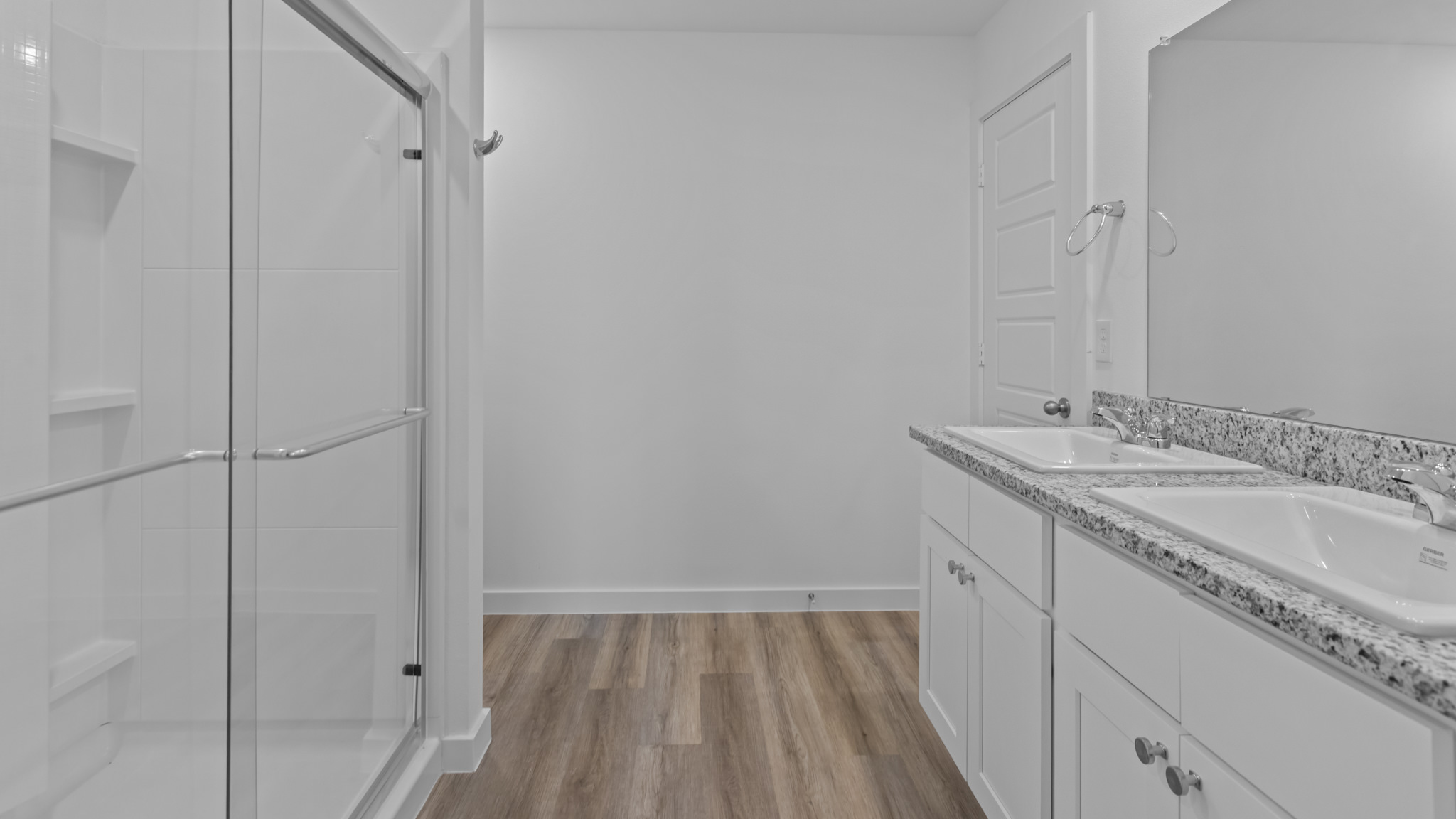 Primary bathroom with luxurious shower and built in storage