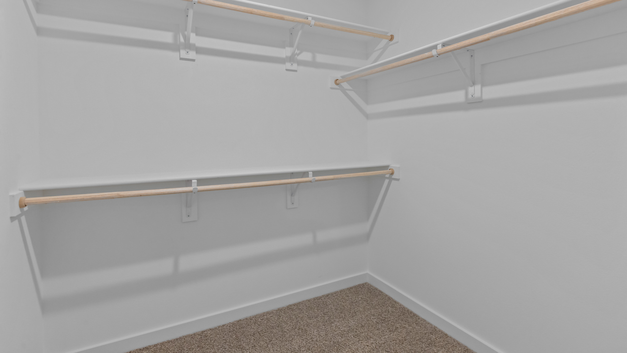 Primary walk-in closet with extra storage space