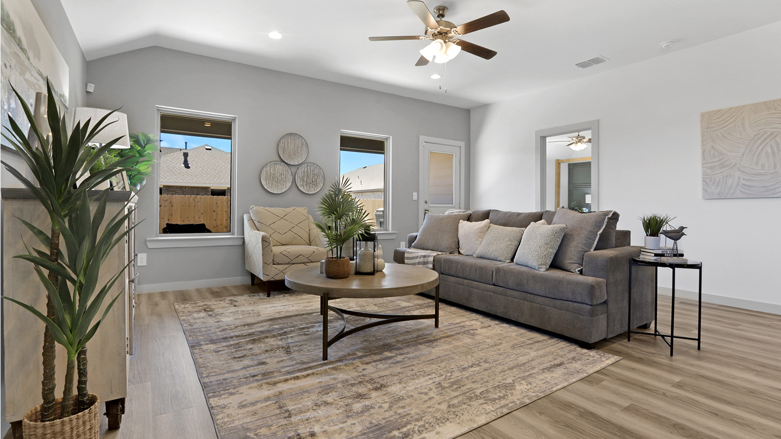 Living space with ceiling fan and recessed lighitng