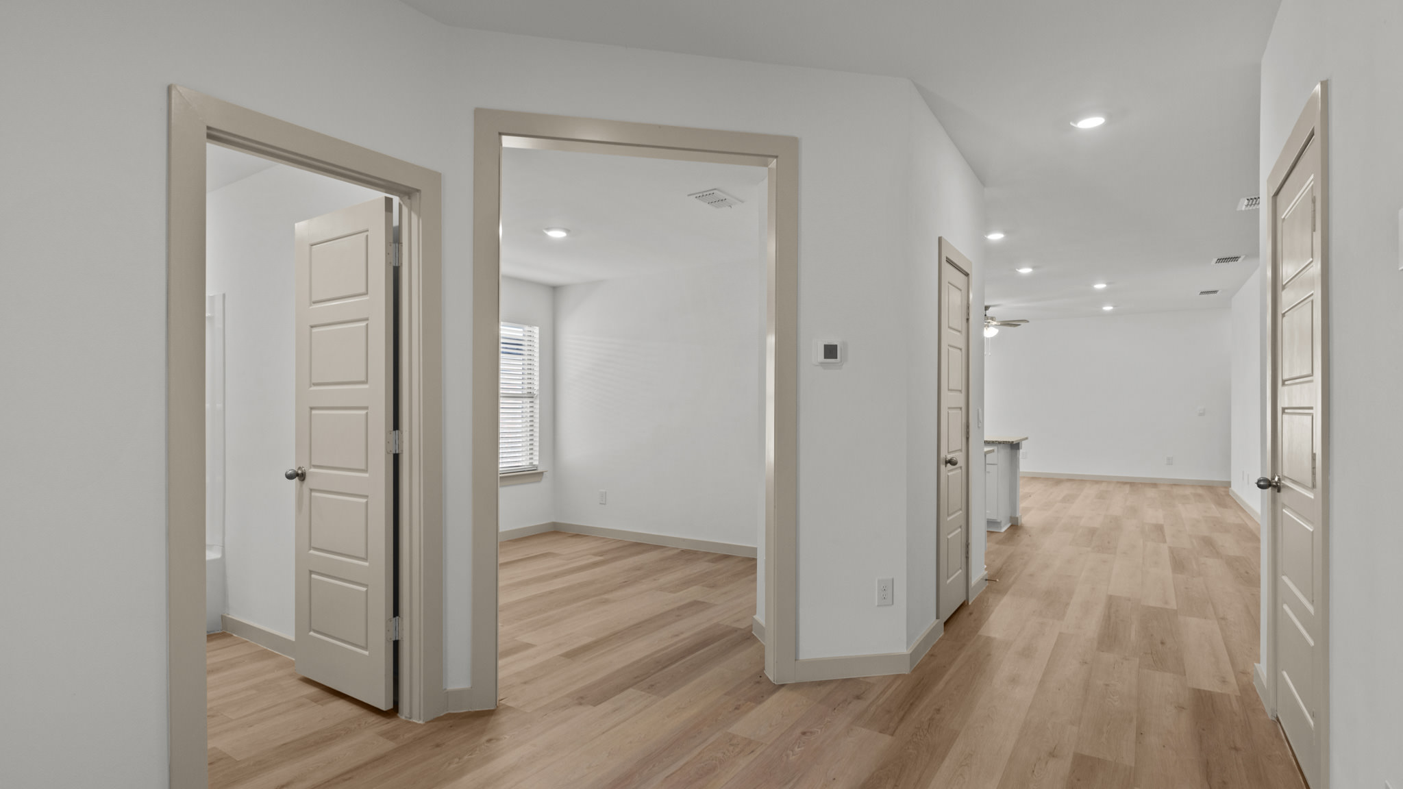 Entry way, white interior, vinyl plank flooring