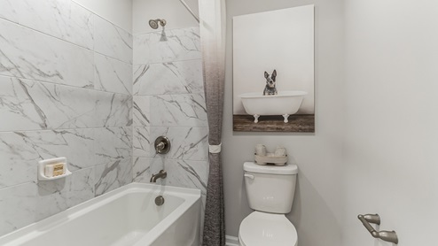 full bathroom with bathtub and shower combo