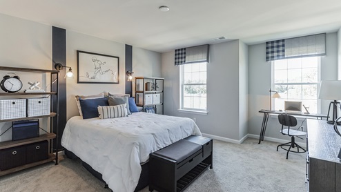 White bedroom with beige carpet