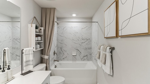 full bathroom with bathtub and shower combo