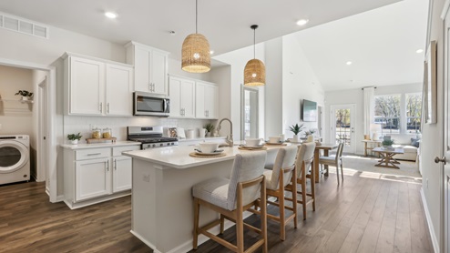 white island with breakfast bar seating