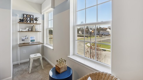 second floor bedroom with beige carpet