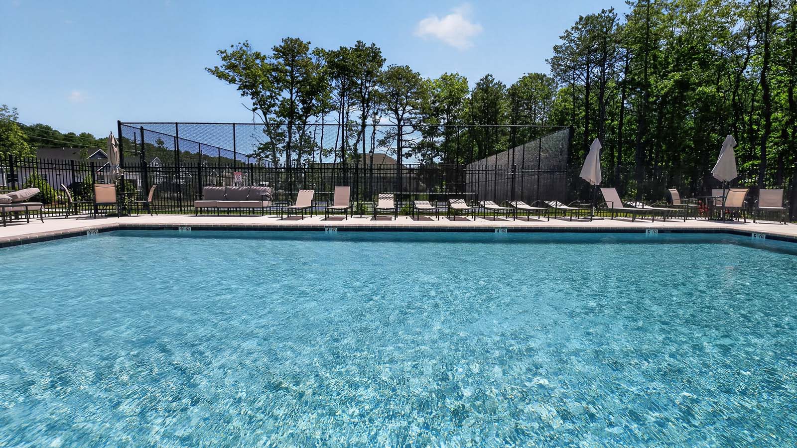 Expansive pool and pool deck at Coves at ocean club