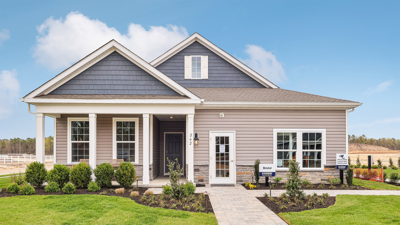 exterior of a bristol model with pink siding