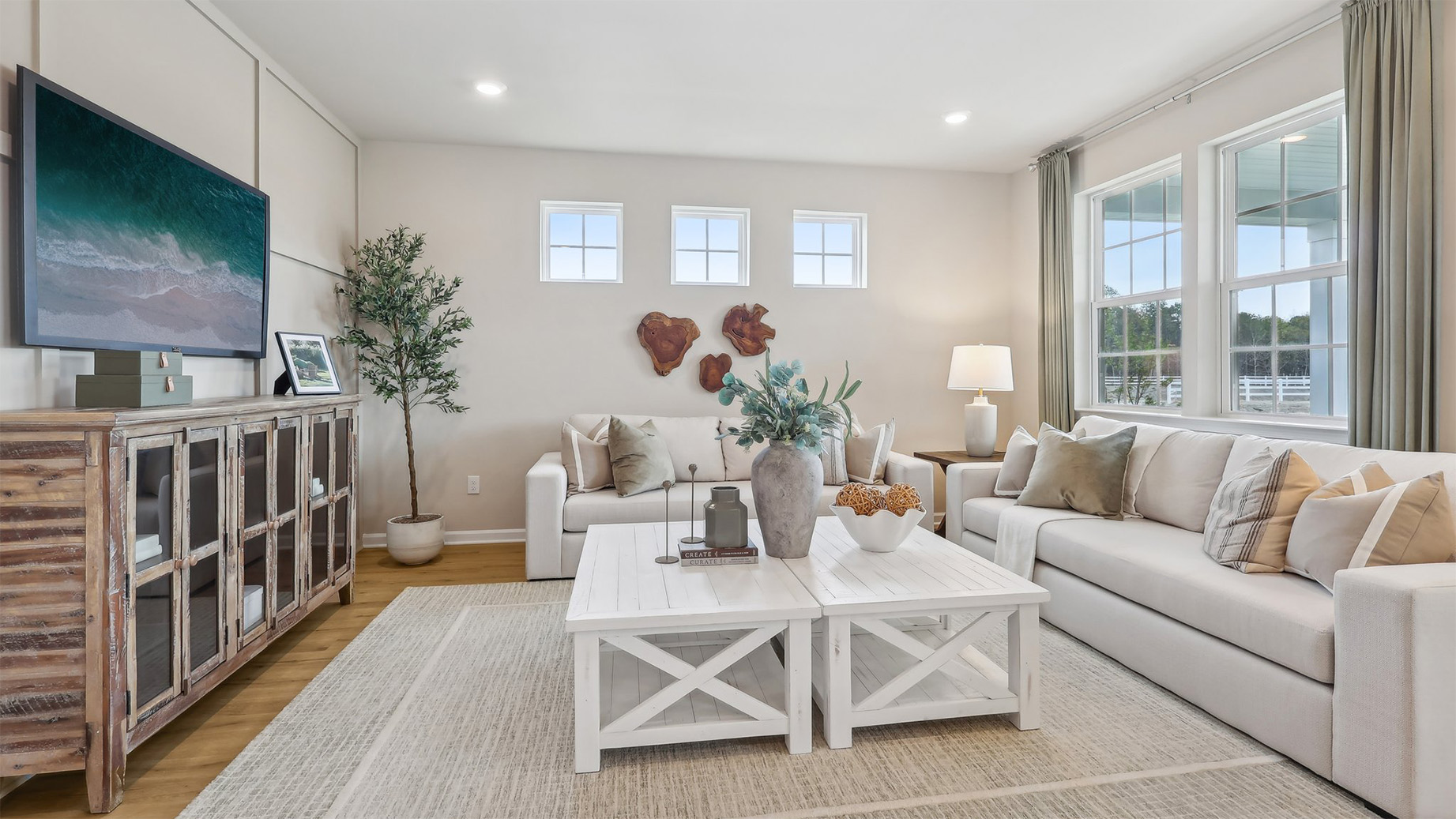 open concept living room with coastal design