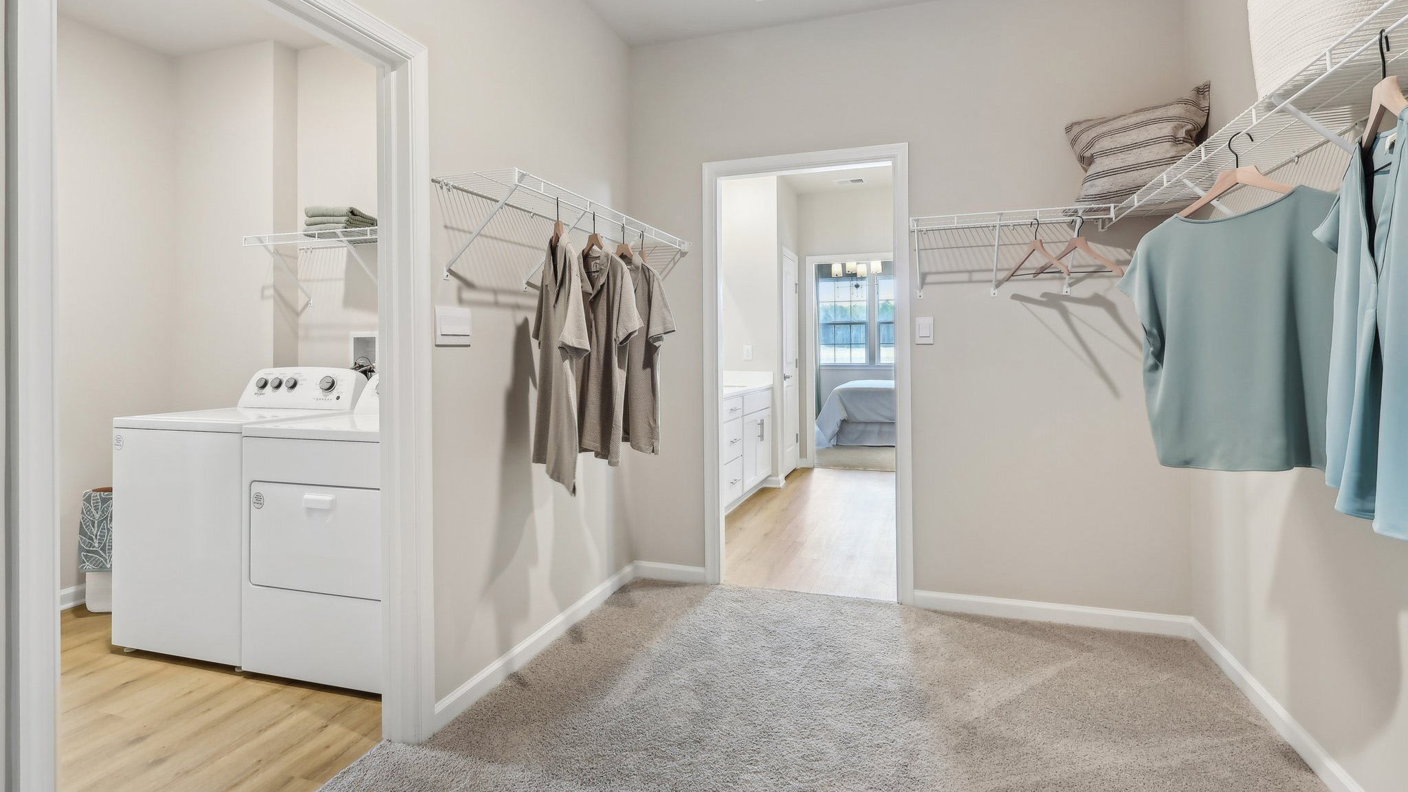 primary walk in closet and laundry room