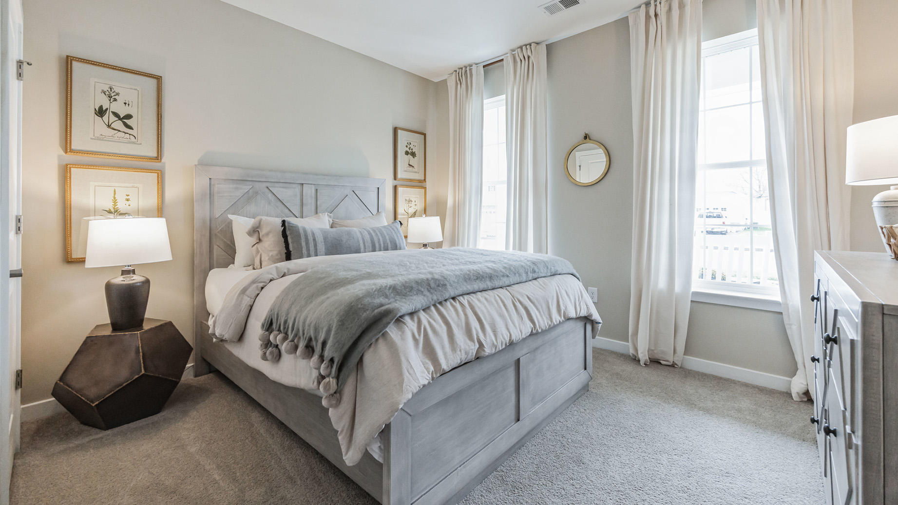 white bedroom with beige carpet
