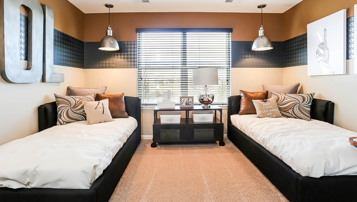 bedroom with beige carpet