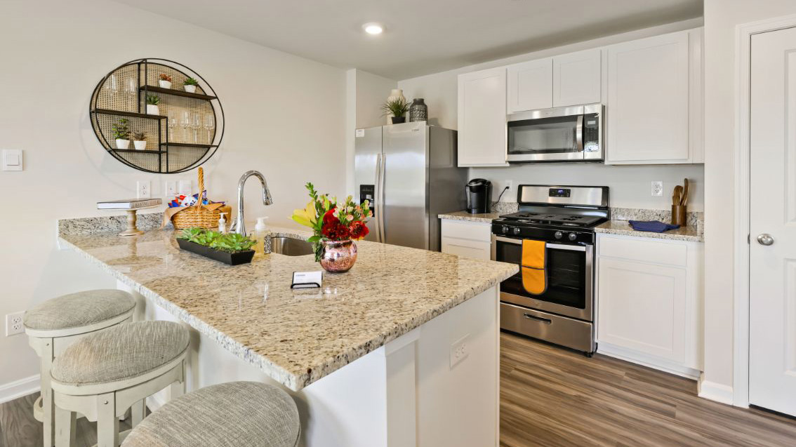 large kitchen island with spacious layout and modern finishes