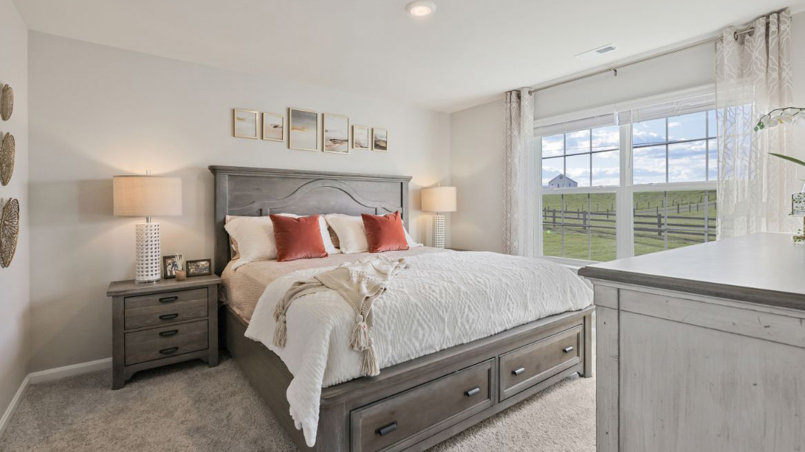 primary bedroom with large windows