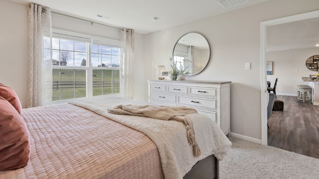 primary bedroom with large windows
