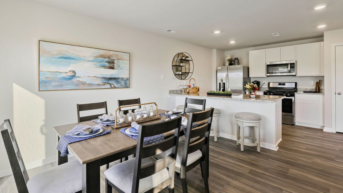 large dining table and kitchen island