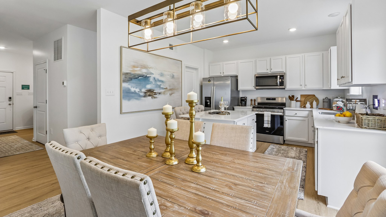 dining table and modern kitchen with quartz island