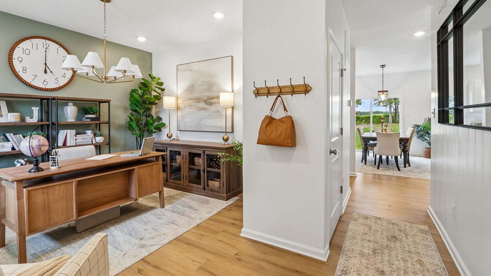 flex room off the main entrance featuring a modern office with large windows