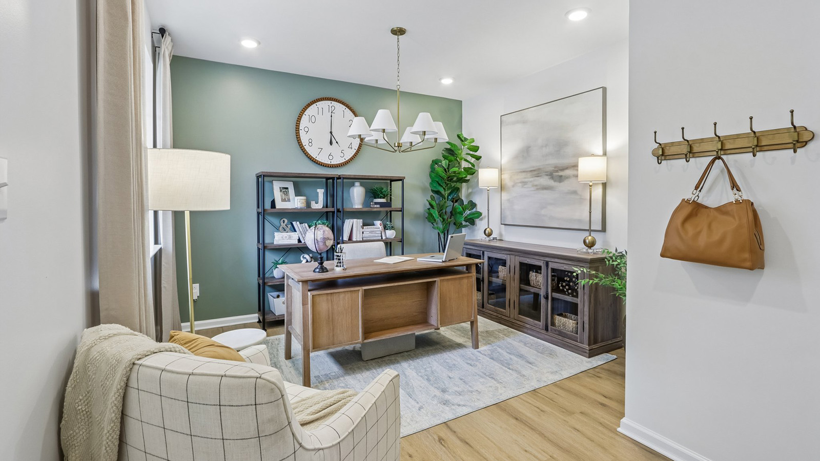 flex room off the main entrance featuring a modern office with large windows