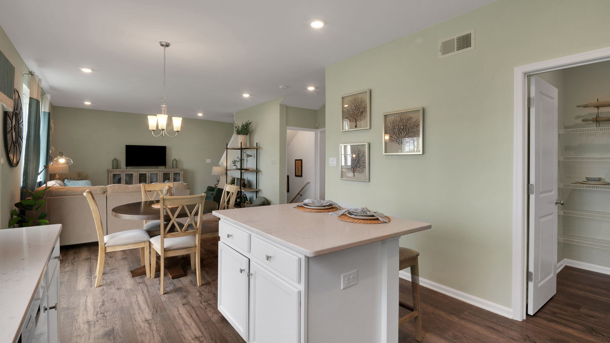 spacious kitchen with large island and pantry