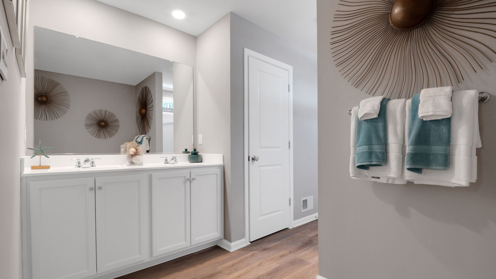 spacious full bath off the primary with double vanity