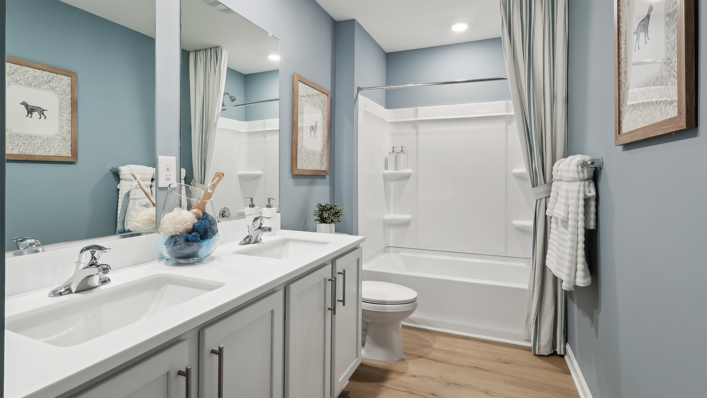 double vanity full bath with blue accents
