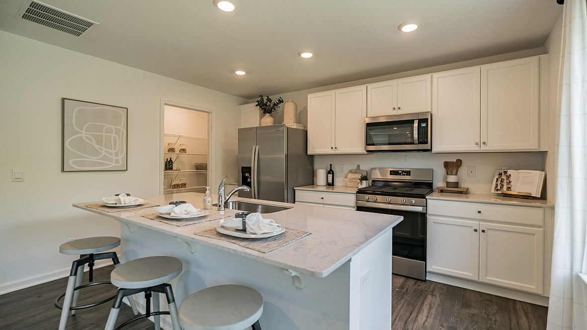 spacious island in a deerfield model