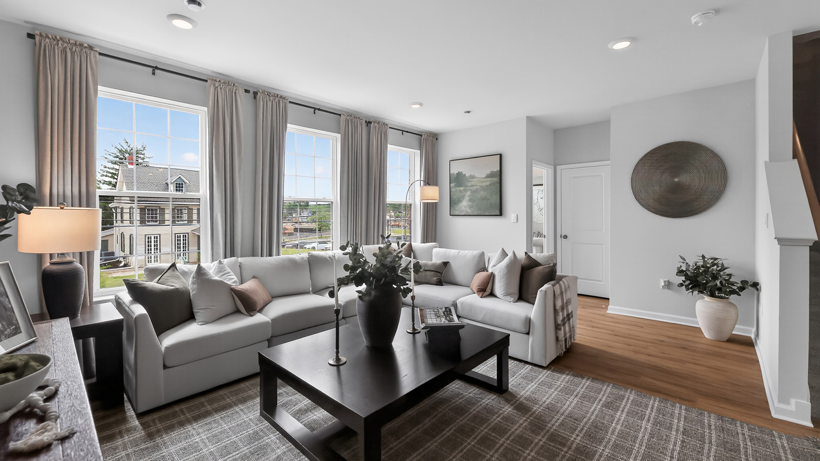 Elmore model main floor living with mid century modern design